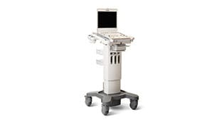 um dispositivo médico branco sobre rodas