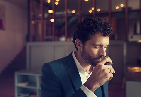 man drinking coffee